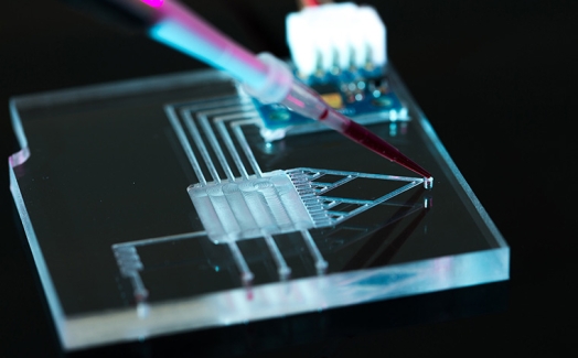 Characterization of microchannels fabricated with laser for microfluidic applications